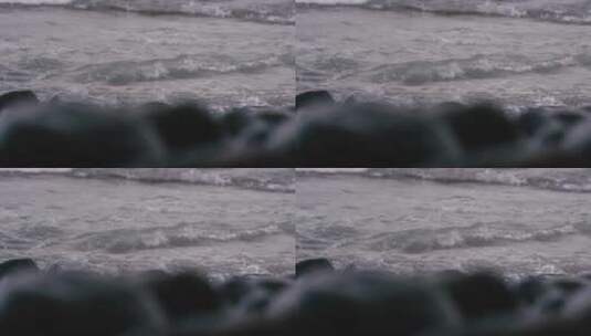 鹅卵石在潮湿的海岸上高清在线视频素材下载