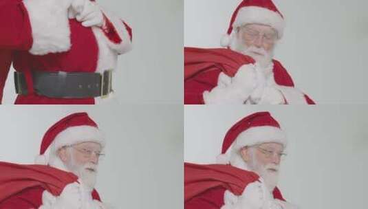 圣诞老人拿着一袋礼物 高清在线视频素材下载