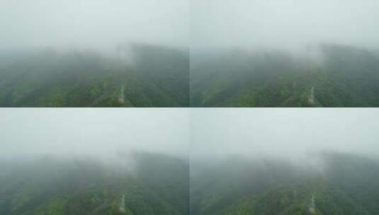 被大雾笼罩的山脉航拍高清在线视频素材下载