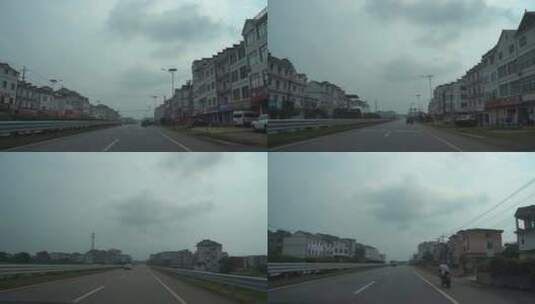 城镇道路车窗外风景汽车行驶移动建筑风光高清在线视频素材下载