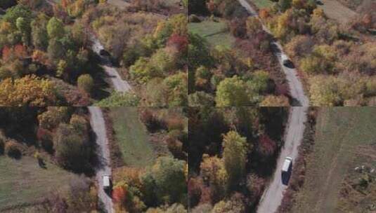 露营车在阳光明媚的乡村道路上行驶，自由冒险，空中高清在线视频素材下载