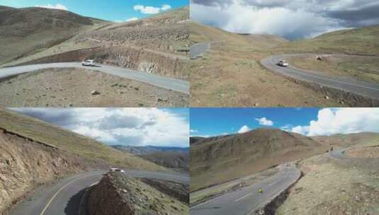 自驾西藏盘山公路航拍S弯山路蓝天白云原片高清在线视频素材下载
