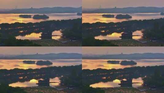 4K航拍清晨的西湖 波光粼粼的金色水面高清在线视频素材下载