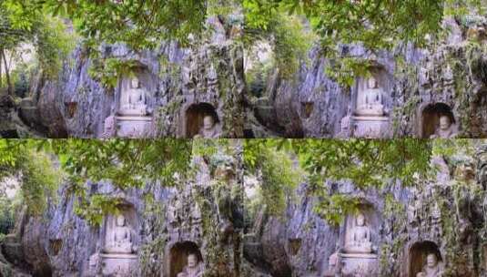 杭州灵隐寺日光照射岩壁上的石佛高清在线视频素材下载