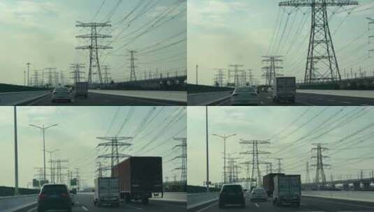 道路两侧的高压线公路电塔中国电力电网铁塔高清在线视频素材下载