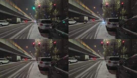 雪夜红绿灯马路电动车高清实拍高清在线视频素材下载