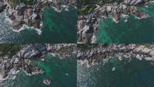 航拍三亚蜈支洲岛海浪碧绿海水礁石游艇沙滩高清在线视频素材下载