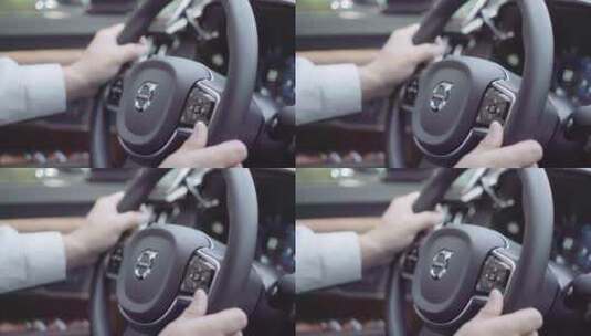 一双手紧握方向盘开车高清在线视频素材下载