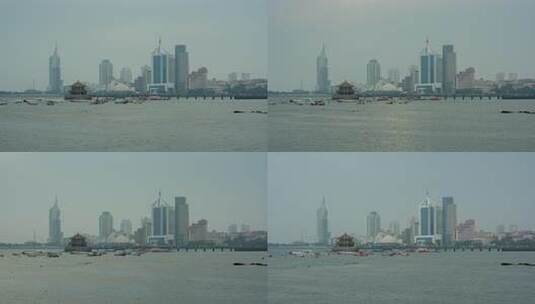 青岛国庆假期阴雨天的栈桥景区高清在线视频素材下载