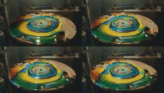 圆形调色板上的多彩油漆高清在线视频素材下载