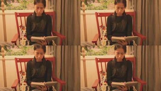 女性室内坐摇椅看书场景高清在线视频素材下载