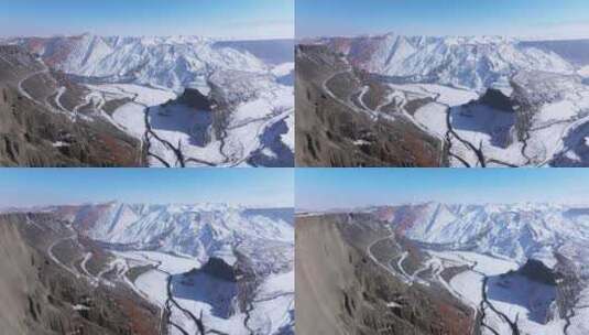 航拍新疆冬季安集海大峡谷山脉雪山高清在线视频素材下载