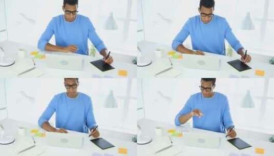 非裔美国创意设计师在笔记本电脑上使用平板高清在线视频素材下载