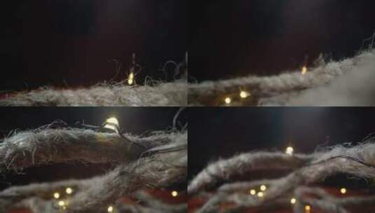 圣诞彩灯缠绕在Abaca绳子上高清在线视频素材下载