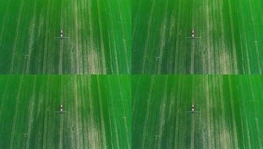 农用机器在农田里喷洒农药高清在线视频素材下载