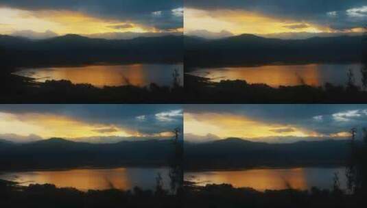 夕阳湖水视频金色日出时金色的高原湖泊湖水高清在线视频素材下载
