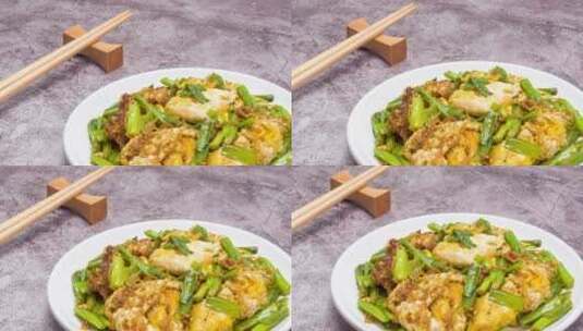 韭菜炒荷包蛋菜品美食4k视频滑轨平移高清在线视频素材下载