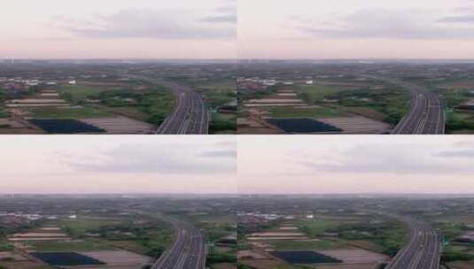 黄昏时候的高速公路经过乡村高清在线视频素材下载