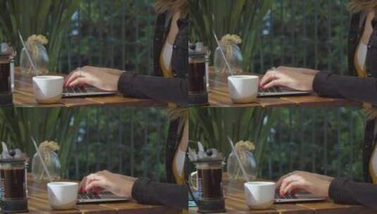 一个人在咖啡厅用手打字的女人高清在线视频素材下载