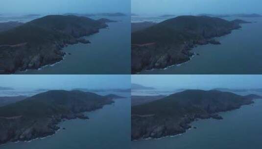 航拍黄昏下的福建平潭岛仙人井附近海边礁石高清在线视频素材下载