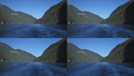 蓝天下的山脉湖泊景观高清在线视频素材下载