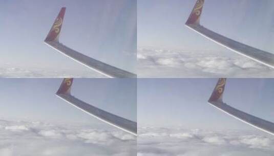 航班上飞机舷窗外天空和机翼高清在线视频素材下载