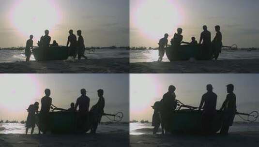 渔民将圆船拖到海滩高清在线视频素材下载