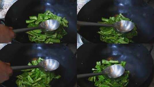 酒店厨房油锅干煸辣椒高清在线视频素材下载