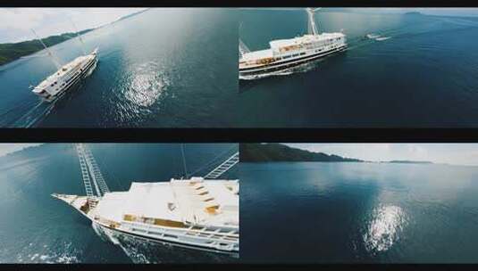 FPV无人机航拍游艇行驶在蓝色大海上四王岛高清在线视频素材下载
