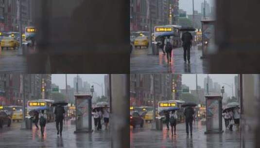 行人走在雨天茫茫的街道上高清在线视频素材下载