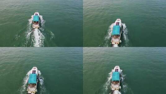 航拍海南三亚湾海面上行驶的游艇与摩托艇高清在线视频素材下载