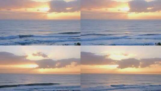 唯美海上日出海面夕阳海浪翻滚阳光穿过云层高清在线视频素材下载