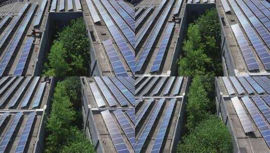 屋顶上的光伏发电站和院子里的树木高清在线视频素材下载