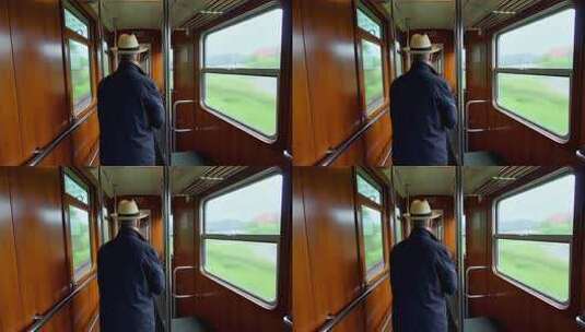 男子于火车车厢内望向窗外高清在线视频素材下载