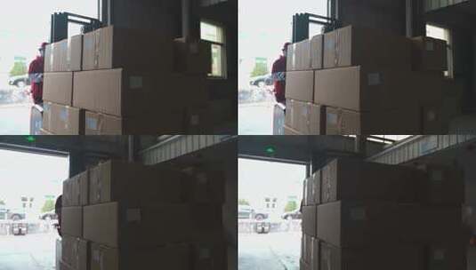 仓库工人操作叉车搬运纸箱高清在线视频素材下载