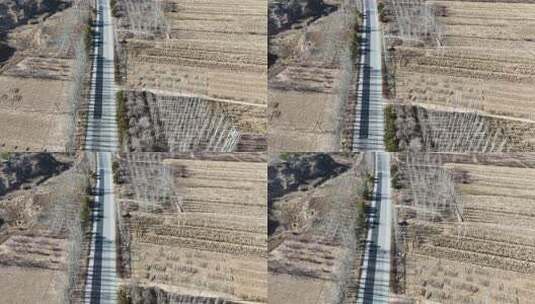 航拍乡村公路田野景象高清在线视频素材下载