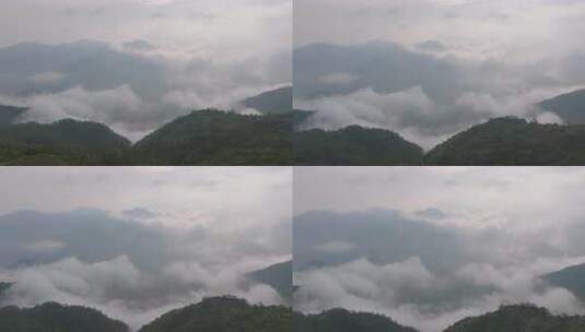 航拍早晨广东茂名信宜石镬坳云雾缭绕的山峦高清在线视频素材下载