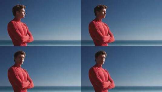 海边红衣男子眺望远方沉思高清在线视频素材下载