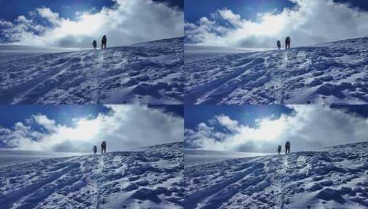 风雪中攀登慕士塔格雪山的登山者高清在线视频素材下载
