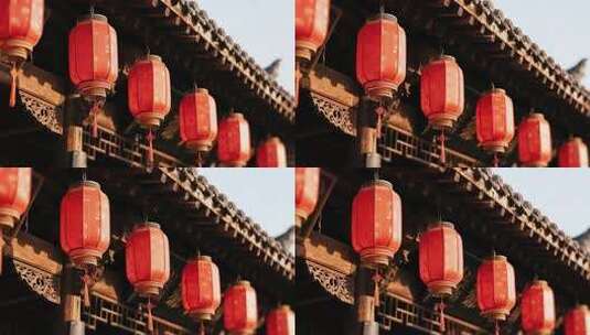 古建筑下悬挂的红色灯笼高清在线视频素材下载