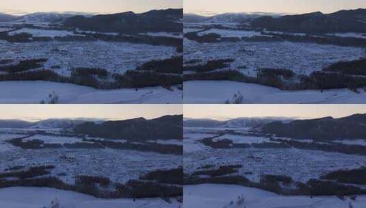 新疆阿勒泰地区禾木村雪景航拍高清在线视频素材下载