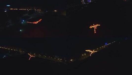 穿越机航拍夜景火凤凰航模表演飞行高清在线视频素材下载