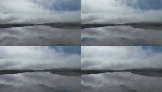 航拍晨雾缭绕的山谷湖泊高清在线视频素材下载