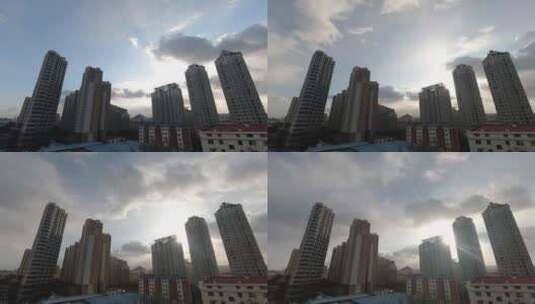 山东威海高区青青小城楼盘上空的云延时4K高清在线视频素材下载