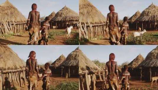 非洲女人走向村庄高清在线视频素材下载