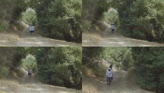 女人帮助拄拐的盲人行走高清在线视频素材下载
