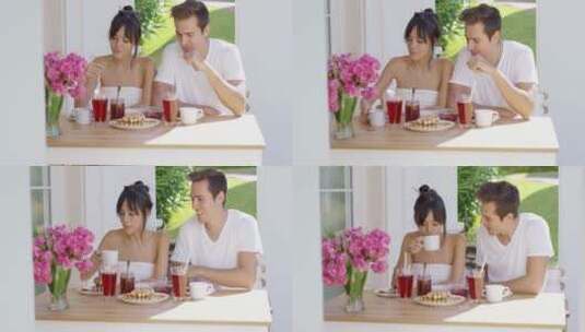 在户外餐桌上吃早餐的夫妇高清在线视频素材下载
