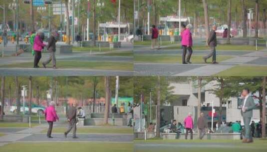 深圳城市广场上走过的一对老年夫妇高清在线视频素材下载
