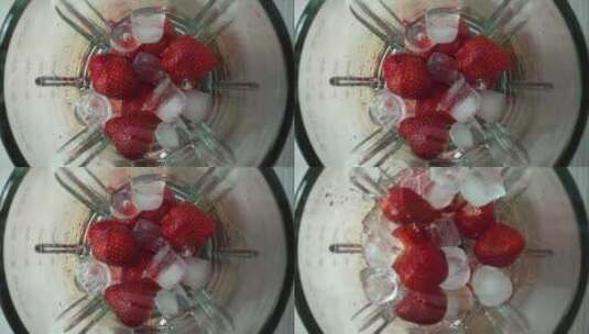 搅拌机里的草莓和冰块高清在线视频素材下载