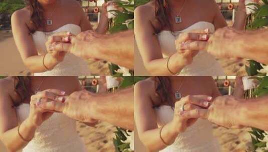新娘将结婚戒指戴在新郎手上高清在线视频素材下载